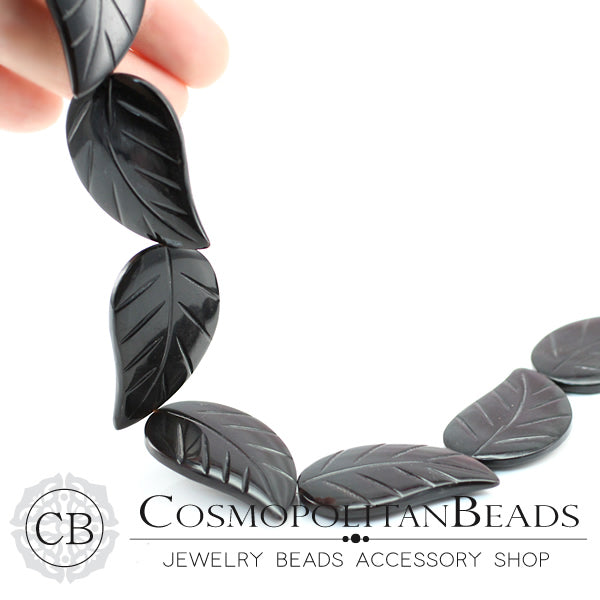 Horn (leaf cut) Size: approx. 43 x 26 mm Thickness: approx. 5.6 mm Hole diameter: approx. 0.6-07 mm 1 piece