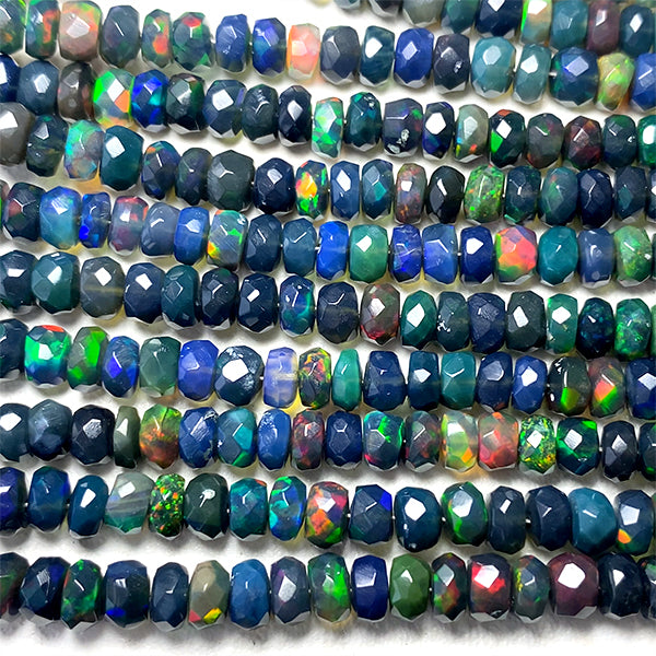 Precious Opal (Button Cut) Black Size: Approx. 2-3.5 x 3-6 mm Hole diameter: Approx. 0.3-0.4 mm