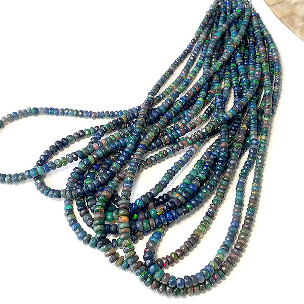Precious Opal (Button Cut) Black Size: Approx. 2-3.5 x 3-6 mm Hole diameter: Approx. 0.3-0.4 mm