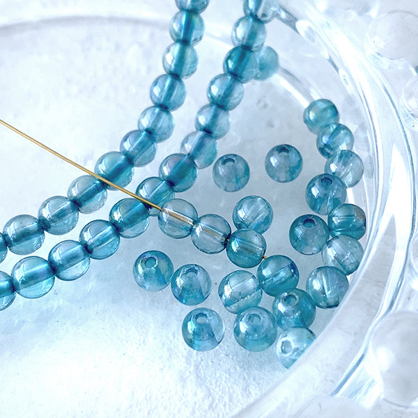 Aquamarine (Round Plain) Aurora Coating Size: Approx. 4mm Hole Diameter: Approx. 0.4-0.5mm 10pcs