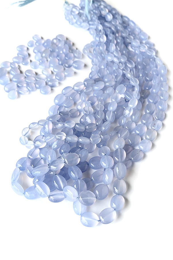 Blue Chalcedony (Flat Oval Plain) Size: Approx. 6-8.5 x 5-7mm Hole Diameter: Approx. 0.4-0.5mm