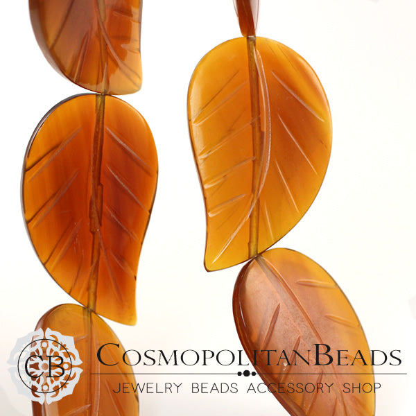 Horn (leaf cut) Size: approx. 43 x 26 mm Thickness: approx. 5.6 mm Hole diameter: approx. 0.6-07 mm 1 piece