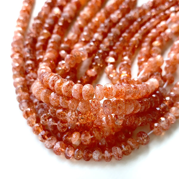 Sunstone (button cut) size about 3~3.5x4~5mm hole diameter about 0.4~0.5mm 10 pieces