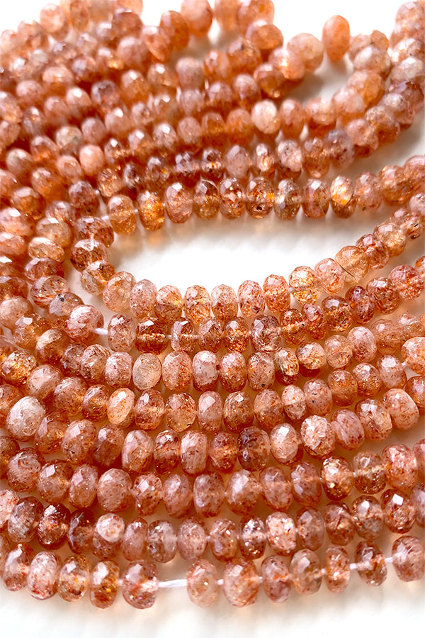 Sunstone (button cut) size about 3~3.5x4~5mm hole diameter about 0.4~0.5mm 10 pieces