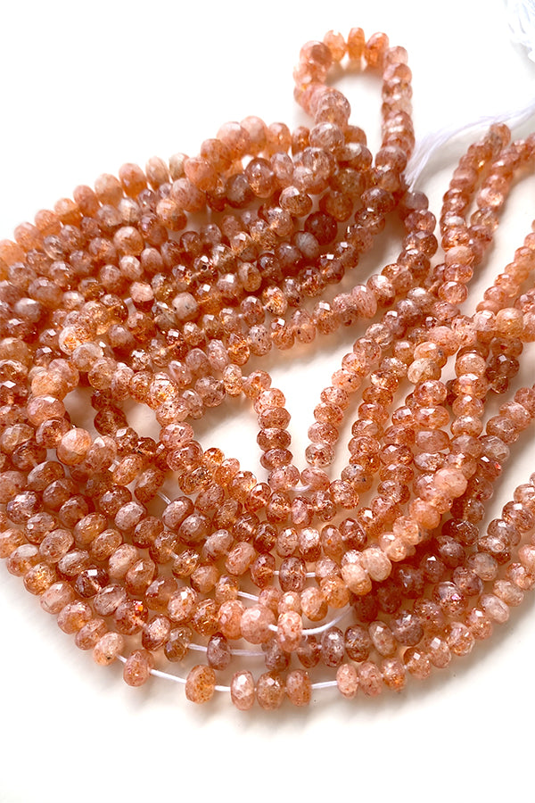 Sunstone (button cut) size about 3~3.5x4~5mm hole diameter about 0.4~0.5mm 10 pieces