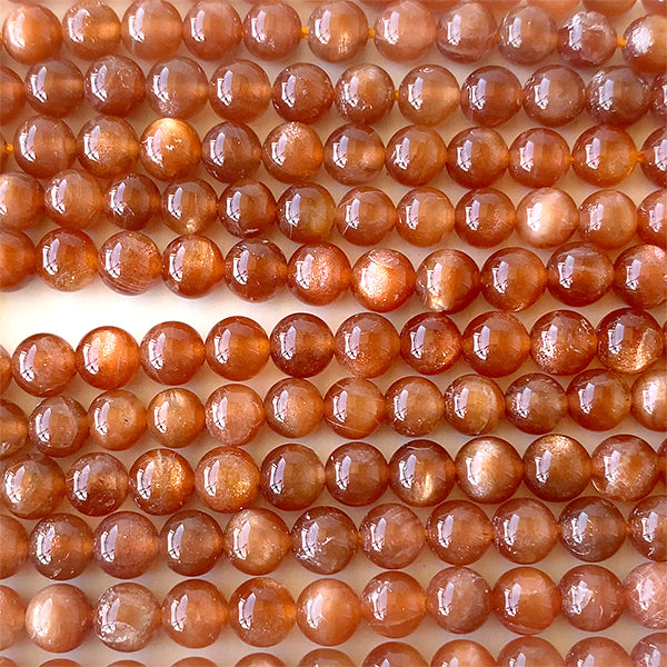 Sunstone (round plane) size about 5.5-6mm hole diameter about 0.6-0.7mm