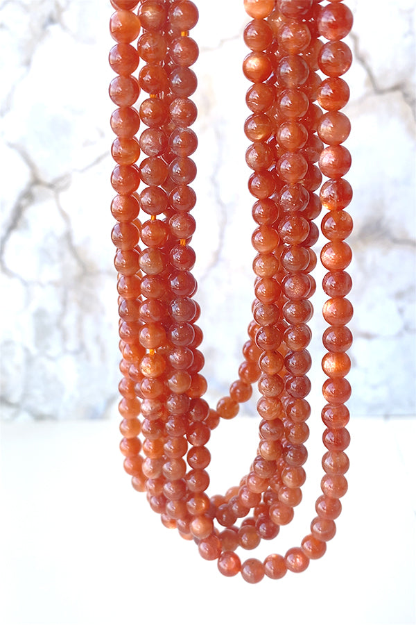 Sunstone (round plane) size about 5.5-6mm hole diameter about 0.6-0.7mm