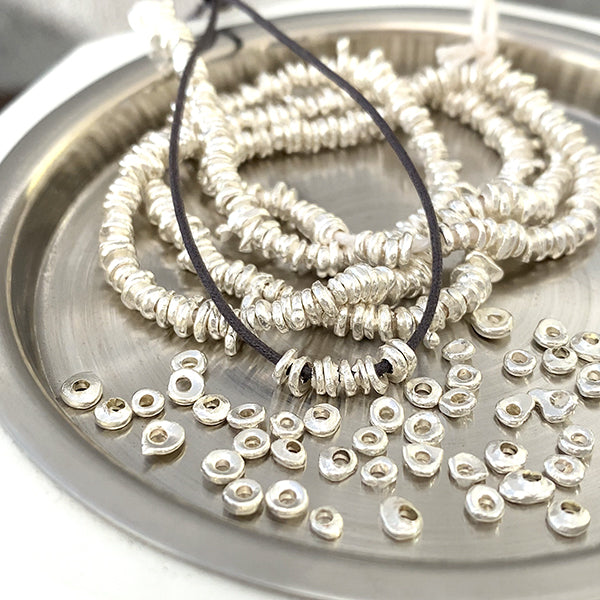 シルバー925 カレンシルバー (スペーサー heishi) 大きさ 約1~1.5×2.5~4mm 穴径 約1mm