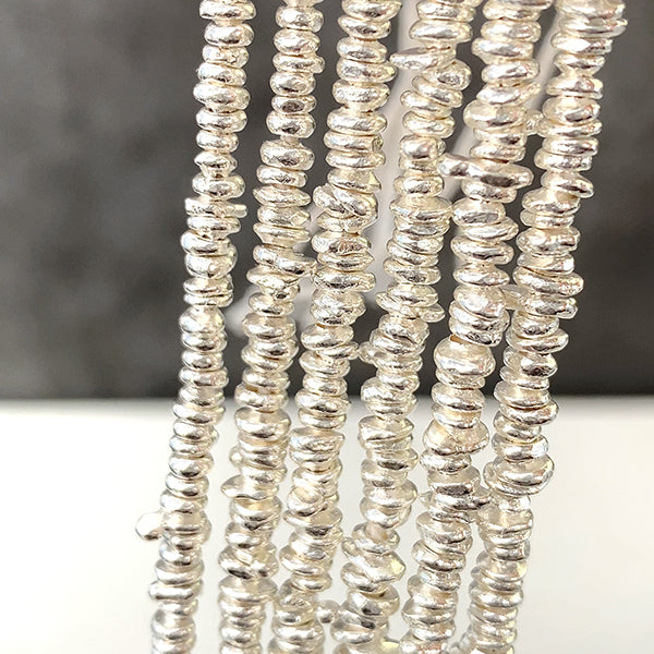 シルバー925 カレンシルバー (スペーサー heishi) 大きさ 約1~1.5×2.5~4mm 穴径 約1mm