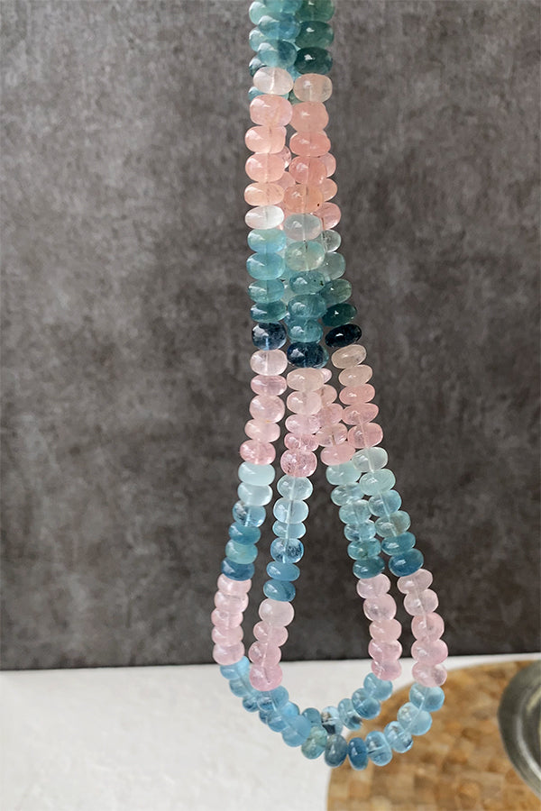 Aquamarine Morganite (Button Plain) Size: Approx. 4.5-6 x 8-9mm Hole diameter: Approx. 0.4-0.5mm