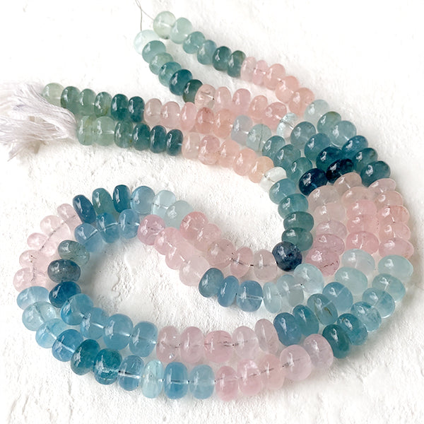 Aquamarine Morganite (Button Plain) Size: Approx. 4.5-6 x 8-9mm Hole diameter: Approx. 0.4-0.5mm