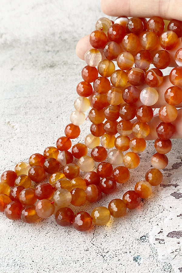 Carnelian (round cut) Size: approx. 10mm Hole diameter: approx. 0.6-0.7mm