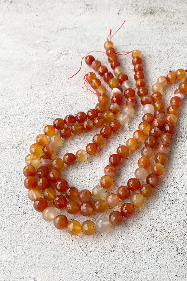 Carnelian (round cut) Size: approx. 10mm Hole diameter: approx. 0.6-0.7mm