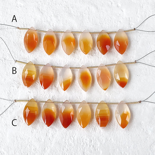 Montana Agate (Marquise Cut) A-C Orange Size: Approx. 10 x 20 mm Hole diameter: Approx. 0.4-0.5 mm 6 pieces