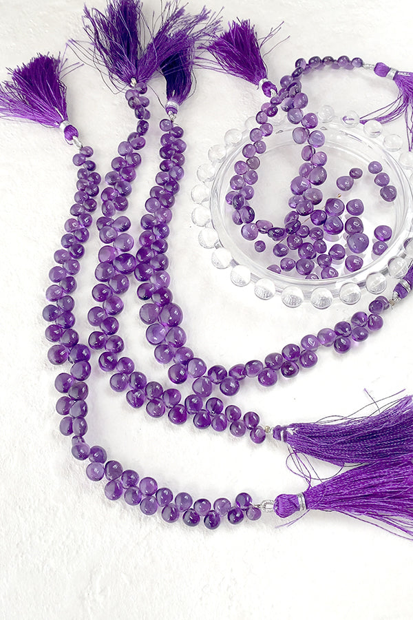 Amethyst (flat maroon plain) Size: approx. 5-9 x 5.5-8.5 mm Hole diameter: approx. 0.4-0.5 mm