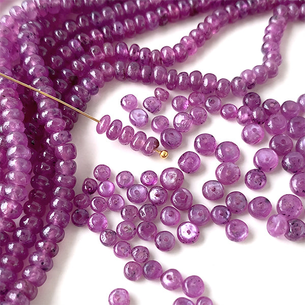 Ruby (button plain) Size approx. 2~2.5 x 2.5~4.5mm Hole diameter approx. 0.3~0.4mm