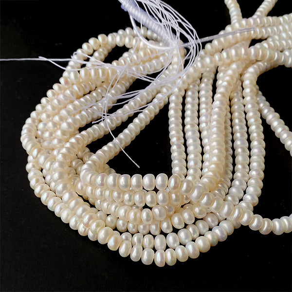 Freshwater pearl (button) Size: approx. 3-5 x 6.3-6.5mm Hole diameter: approx. 0.4-0.5mm