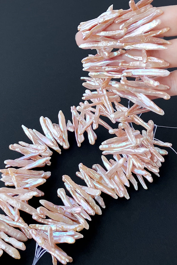 Freshwater pearl (stick loquat branch) Size: Approx. 4.5-5.5 x 28-38mm Color: Natural pink