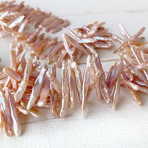 Freshwater pearl (stick loquat branch) Size: Approx. 4.5-5.5 x 28-38mm Color: Natural pink