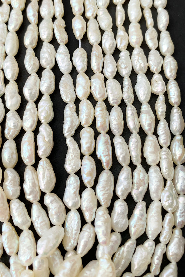 淡水パール (ライス ライスバロック ロングライス) 大きさ 約8.5~9×4.5~5mm 穴径 約0.4~0.5mm 約45~48個 約40cm
