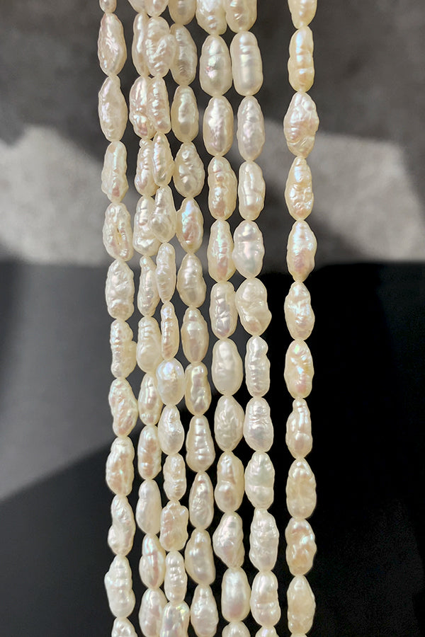 淡水パール (ライス ライスバロック ロングライス) 大きさ 約8.5~9×4.5~5mm 穴径 約0.4~0.5mm 約45~48個 約40cm