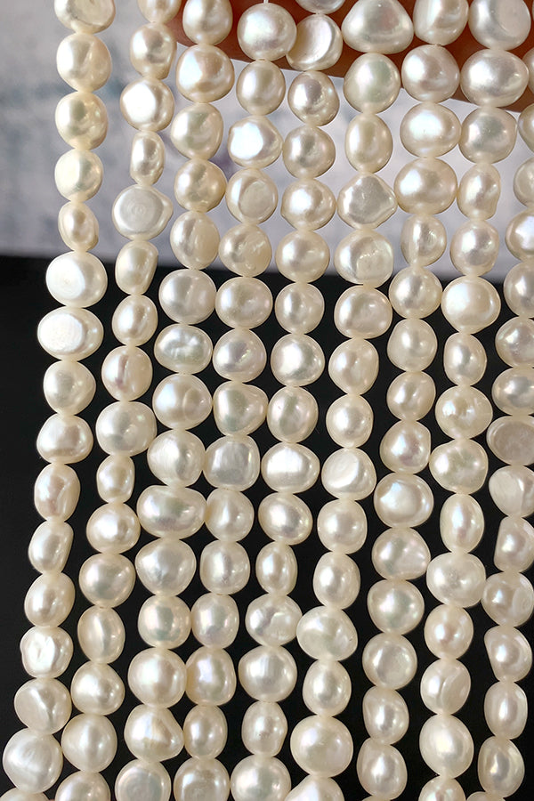 淡水パール (フラットポテト) 大きさ 約6.5~7×7~8mm 穴径 約0.5mm 約50~52個 約35cm