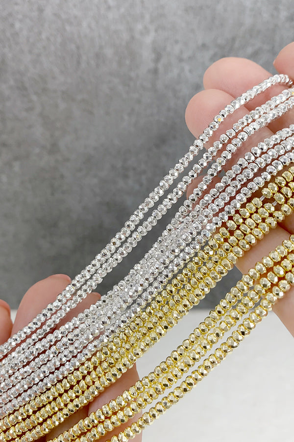 ヘマタイト (ボタンカット) ライトゴールド 大きさ 約2×3mm 穴径 約0.4~0.5mm