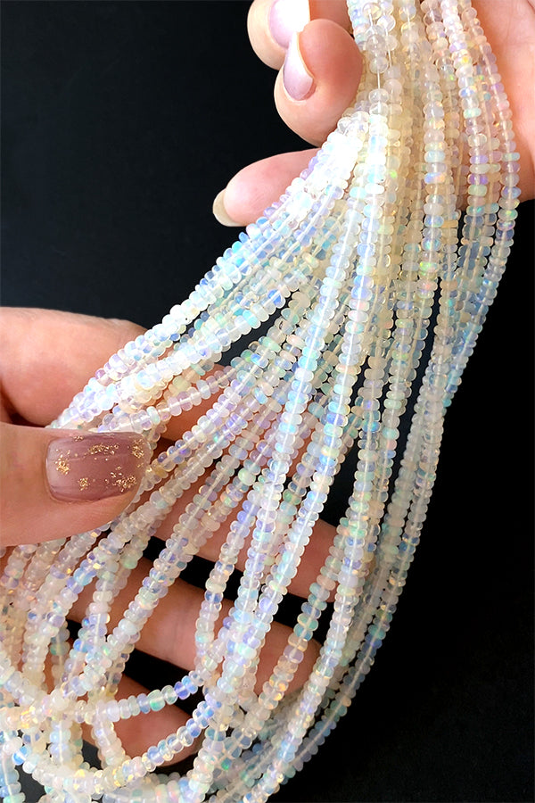 Precious Opal (Button Plain) Size Approx. 1.5~2.5 x 3~4mm Hole Diameter Approx. 0.3~0.4mm