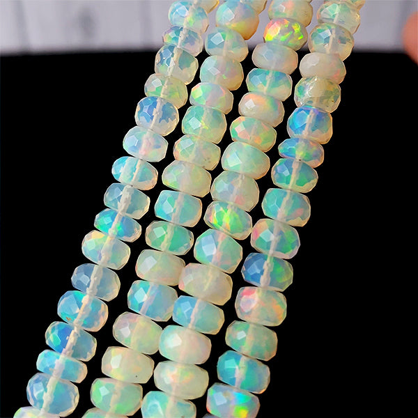Precious Opal Ethiopian Opal (Button cut) Size approx. 2~3.5 x 4~7mm Hole diameter approx. 0.3~0.4mm