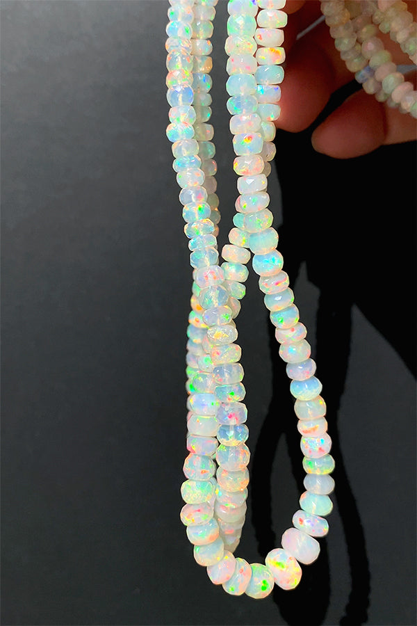 Precious Opal Ethiopian Opal (Button cut) Size approx. 2~3.5 x 4~7mm Hole diameter approx. 0.3~0.4mm