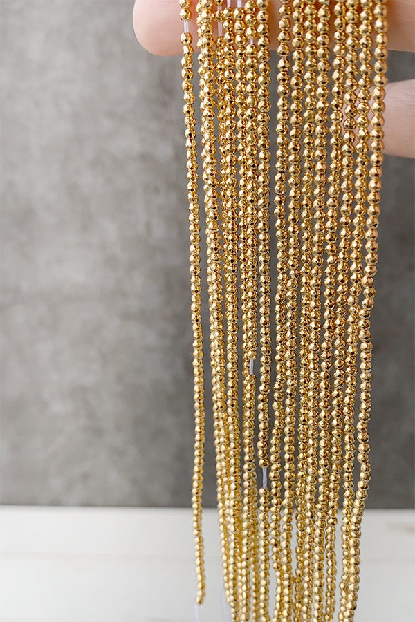 Hematite (Round Cut) Gold Size: Approx. 2 x 2.3 mm Hole diameter: Approx. 0.6 mm