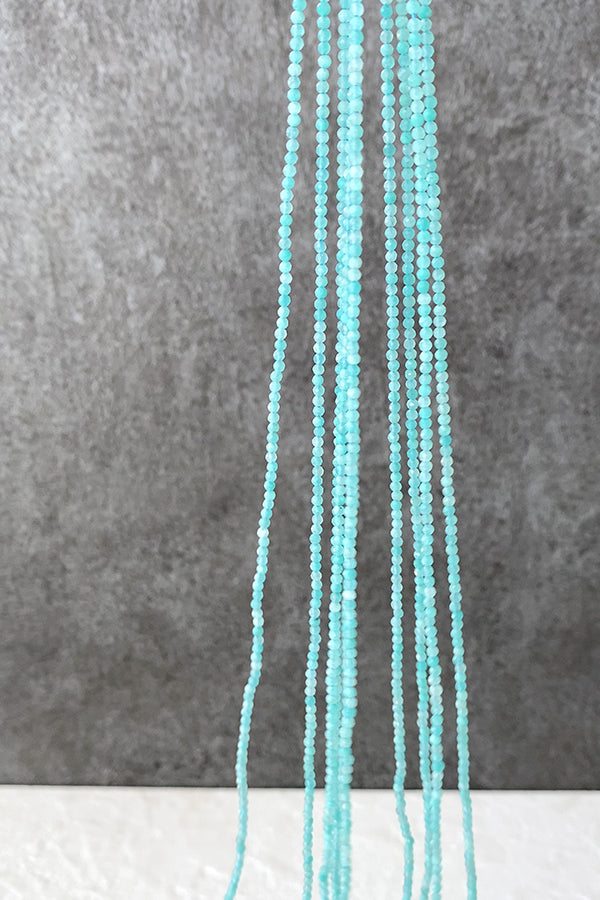 【天然石】 アマゾナイト （ラウンドカット） 大きさ　約2～2.2mm 穴径　約0.4～0.5mm