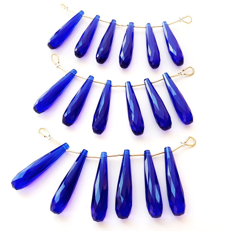 Synthetic stone cobalt blue quartz (long drop cut) Size approx. 8 x 35mm Hole diameter approx. 0.4~0.5mm 1 piece 