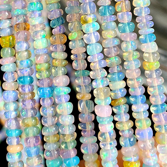 【天然石】 プレシャスオパール エチオピアンオパール （ボタンプレーン） ミックス 大きさ　約1.5～2.5×3.5～4mm 穴径　約0.3～0.4mm