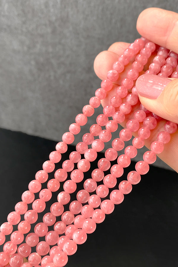 【天然石】 ロードクロサイト （ラウンドプレーン） 大きさ　約5.5～6×5.5～6mm 穴径　約0.4～0.5mm