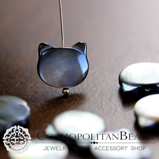 【シェル】ブラックシェル （ネコ　ねこ　猫） 大きさ　約8.5×9.5mm 穴径 0.6mm