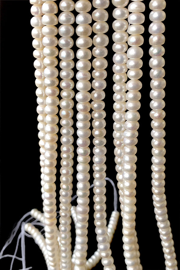 Freshwater pearl (button) Size: approx. 3-5 x 6.3-6.5mm Hole diameter: approx. 0.4-0.5mm 