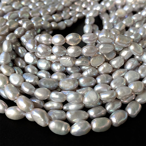 Freshwater pearl (baroque) Gray Size: Approx. 7-7.5 x 5.5-6.5 mm Hole diameter: Approx. 0.5 mm