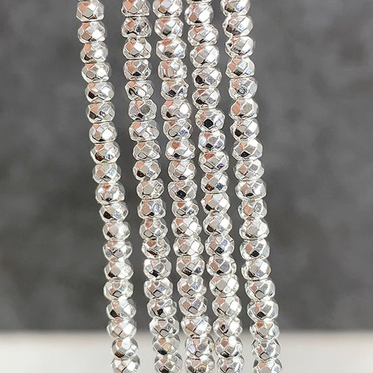 【天然石】ヘマタイト （ボタンカット） シルバー 大きさ　約2×3mm 穴径　約0.4～0.5mm