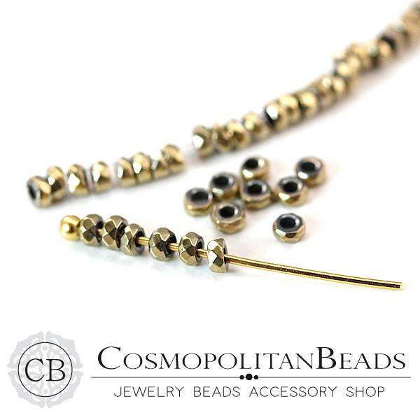 【天然石】ヘマタイト （ボタンカット） カラー　ライトゴールド 大きさ　約1×2mm 穴径　約0.8mm