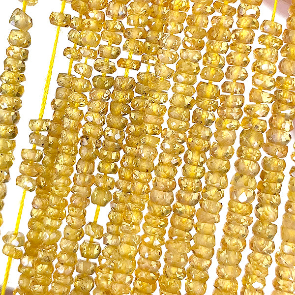 【天然石】 イエローサファイヤ （ボタンカット） 大きさ　約1～1.4×2～3mm 穴径　約0.3～0.4mm