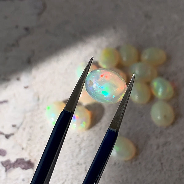 Precious Opal (Oval Plain Cabochon) Size: Approx. 8 x 10mm Hole Diameter: Approx. 0.7~0.8mm 1 piece