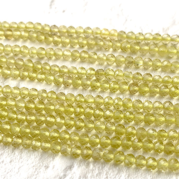 Lemon quartz (button cut) Size: Approx. 2.2-2.4 x 4 mm Hole diameter: Approx. 0.3-0.4 mm