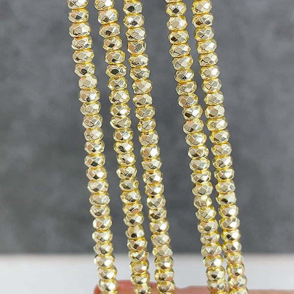 ヘマタイト （ボタンカット） ライトゴールド 大きさ　約2×3mm 穴径　約0.4～0.5mm