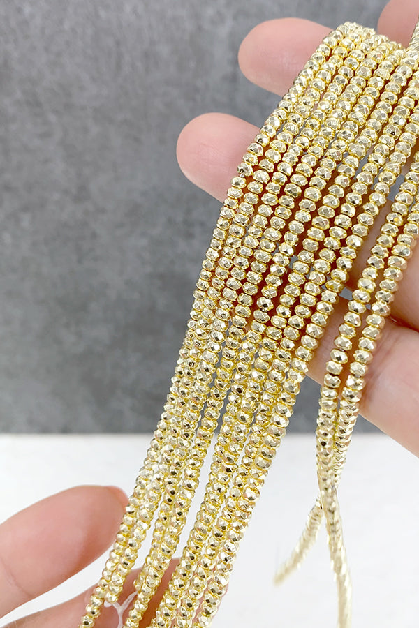 ヘマタイト （ボタンカット） ライトゴールド 大きさ　約2×3mm 穴径　約0.4～0.5mm