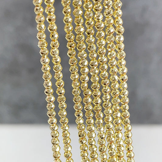 【天然石】ヘマタイト （ラウンドカット） ライトゴールド 大きさ　約2～2.3mm 穴径　約0.6mm